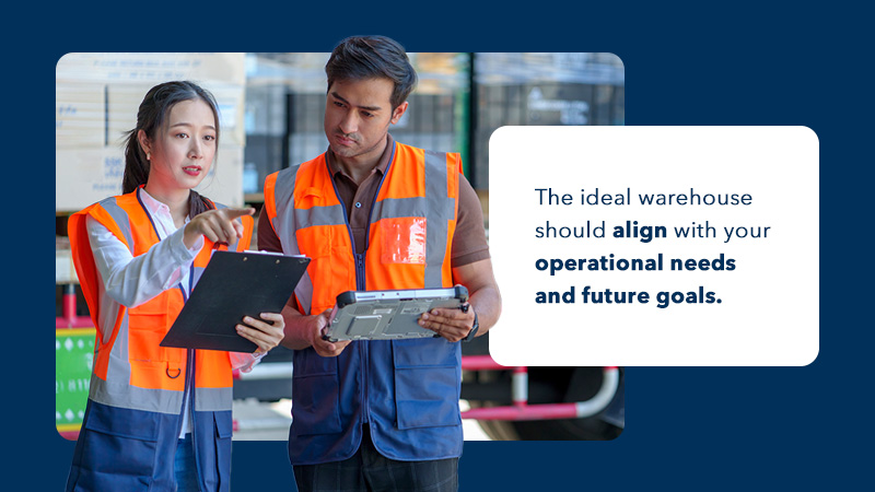 man and woman wearing reflective vests in a warehouse holding tablets